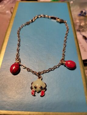 Gold Chain Bracelet with Red Ladybug and Cream Crab Charms
